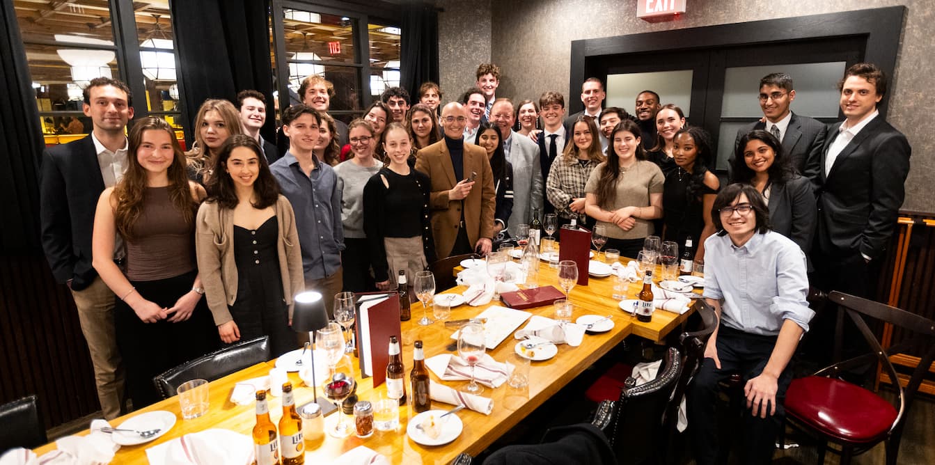 Group picture at dinner table